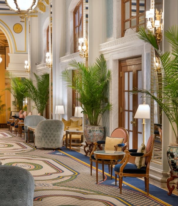 The Willard InterContinental lobby with palm-lined seating